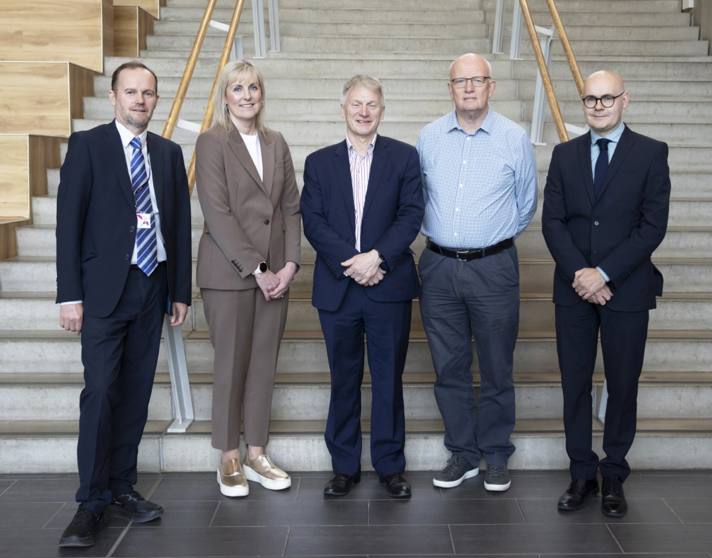 Ivan McKee MSP with Glasgow Kelvin College staff, including Principal Joanna Campbell, standing on the Springburn Campus staircase. Ivan McKee MSP with Glasgow Kelvin College staff, including Principal Joanna Campbell, standing on the Springburn Campus staircase.